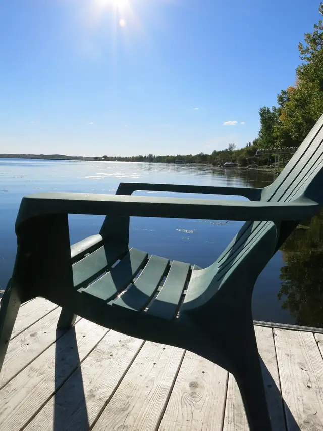 Deck chair on a dock at Jackfish Lake